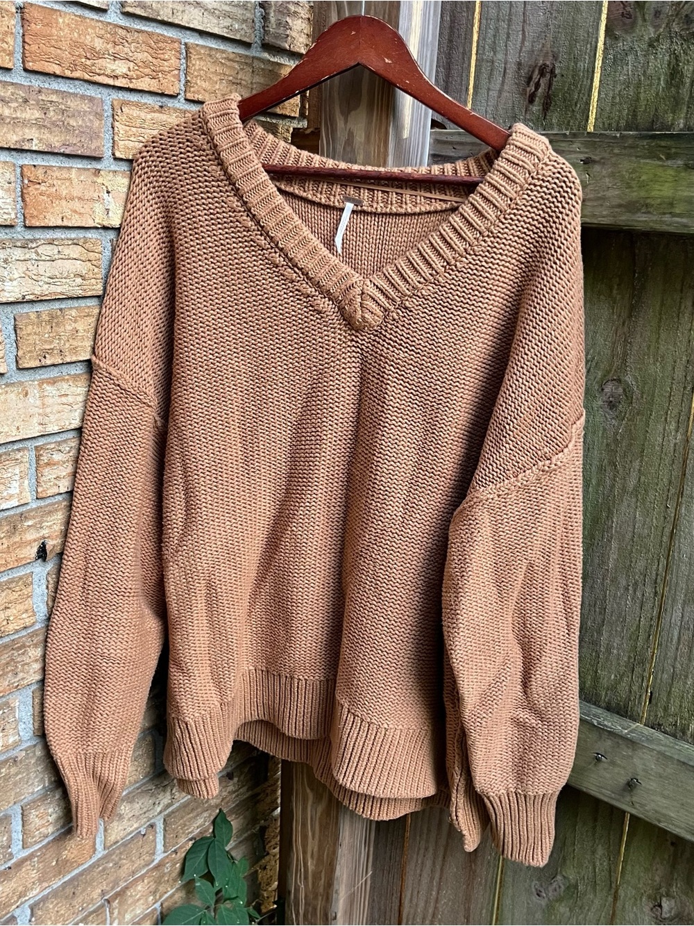 Free People Oversized V-Neck Sweater in Camel Brown